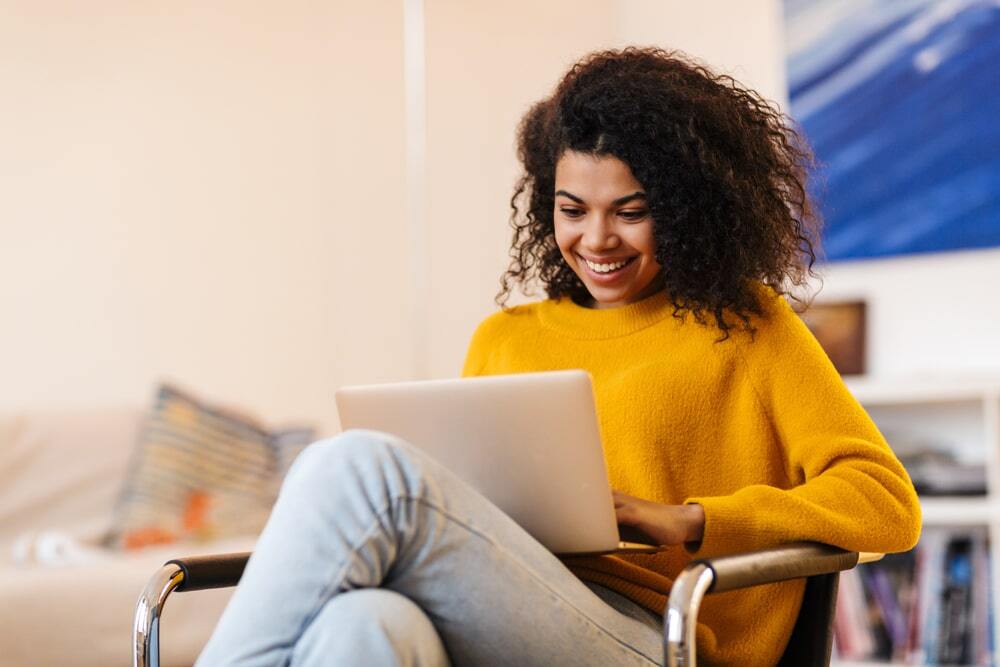 woman booking on desktop